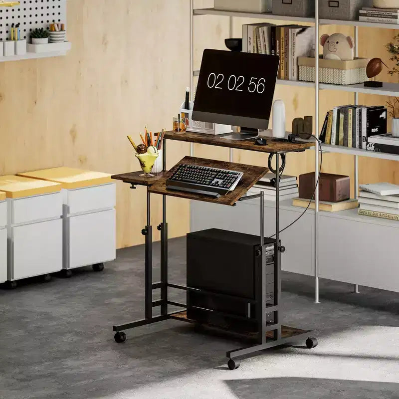 HOMCOM Standing Desk with Power Outlets Height Adjustable Stand Up Desk with Tiltable Tabletop Lockable Wheels Shelf for Home Office