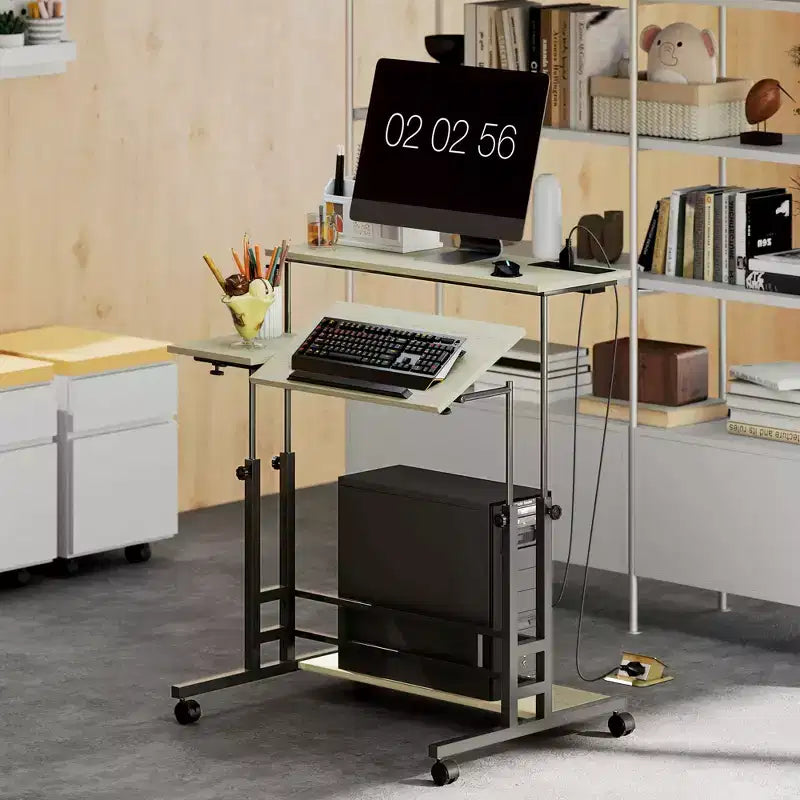 HOMCOM Standing Desk with Power Outlets Height Adjustable Stand Up Desk with Tiltable Tabletop Lockable Wheels Shelf for Home Office