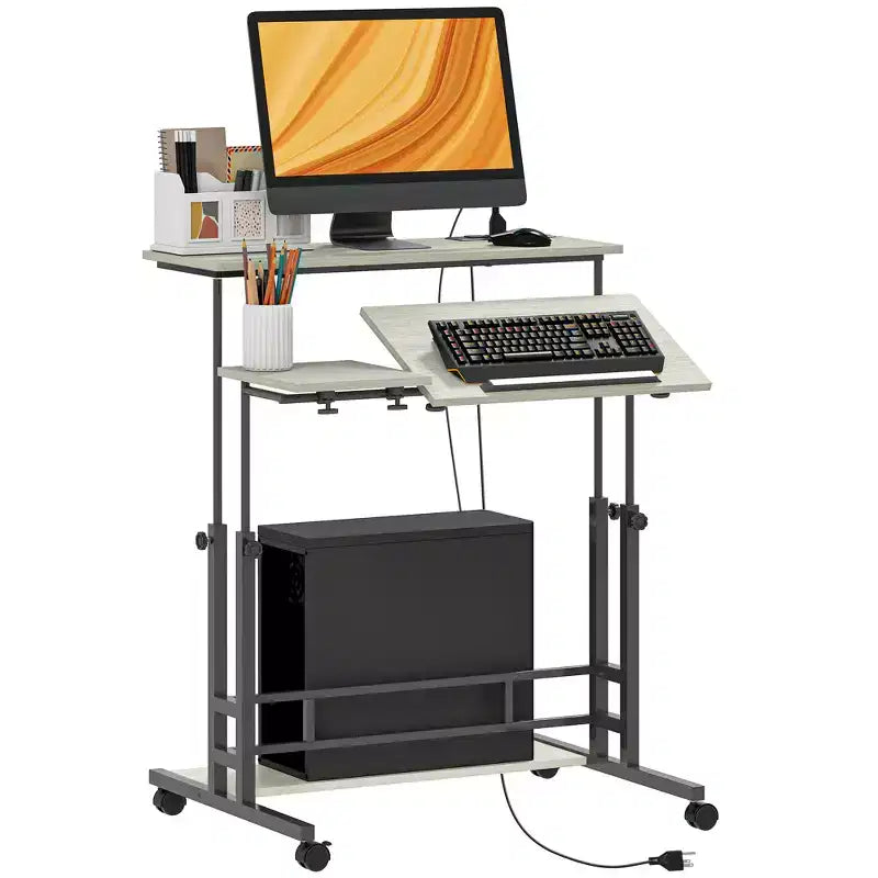 HOMCOM Standing Desk with Power Outlets Height Adjustable Stand Up Desk with Tiltable Tabletop Lockable Wheels Shelf for Home Office